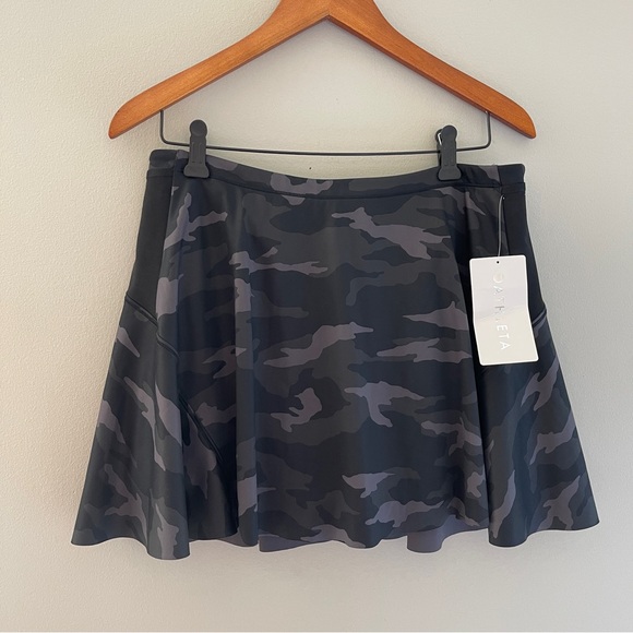 Athleta Dresses & Skirts - Athleta Black Match Point Printed Skort in Supersonic Size Medium NWT